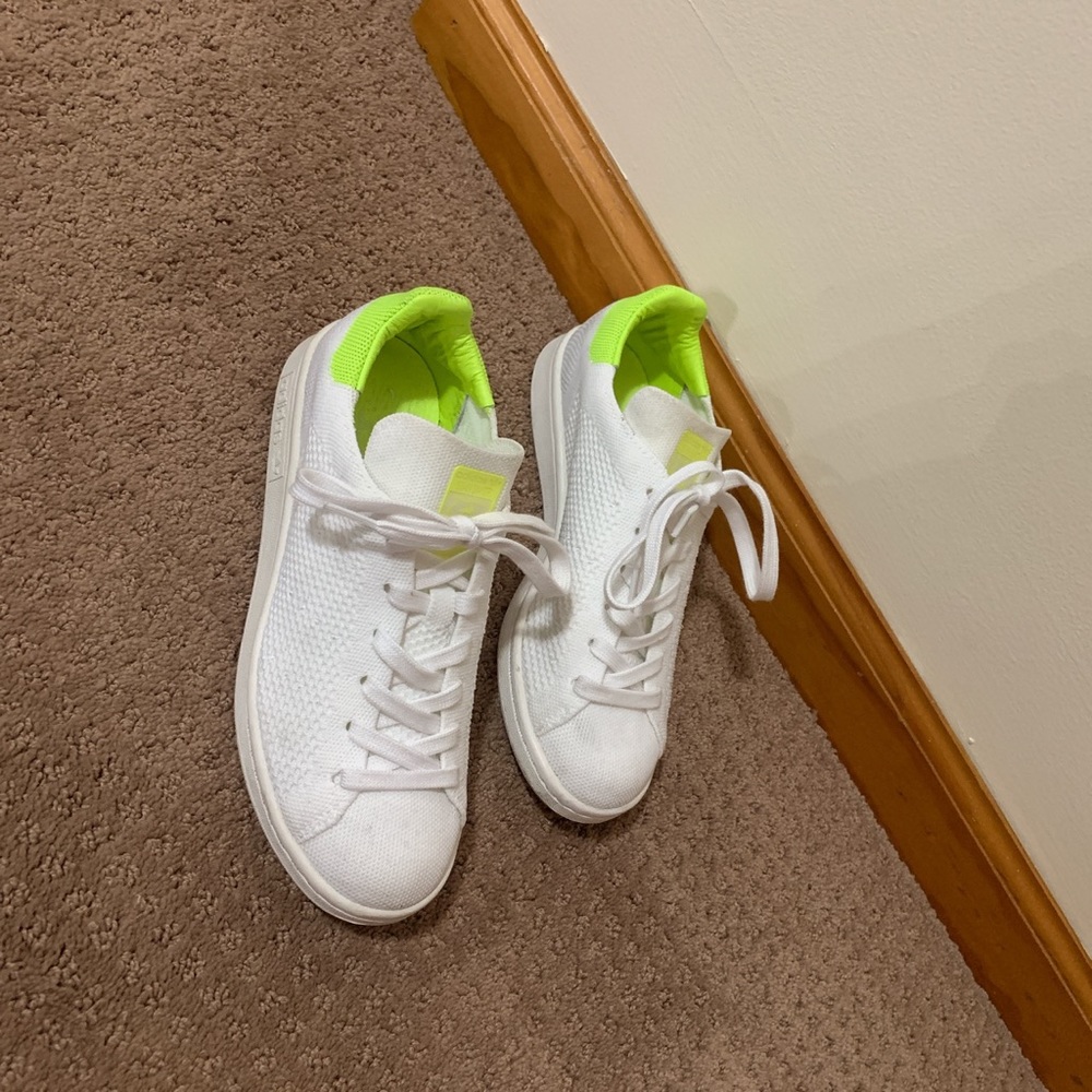 White and neon green stand smith